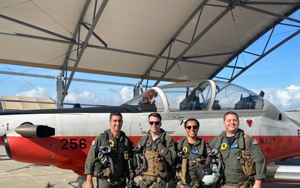 Navy pilots assist civilian aircraft in distress