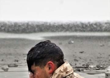 6th Marine Regiment troops jump in for cold-water immersion training at Fort McCoy