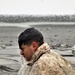 6th Marine Regiment troops jump in for cold-water immersion training at Fort McCoy