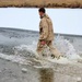 6th Marine Regiment troops jump in for cold-water immersion training at Fort McCoy