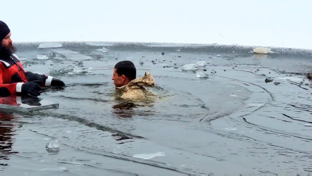 6th Marine Regiment troops jump in for cold-water immersion training at Fort McCoy