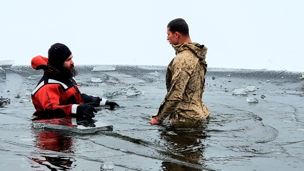 6th Marine Regiment troops jump in for cold-water immersion training at Fort McCoy