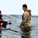 6th Marine Regiment troops jump in for cold-water immersion training at Fort McCoy