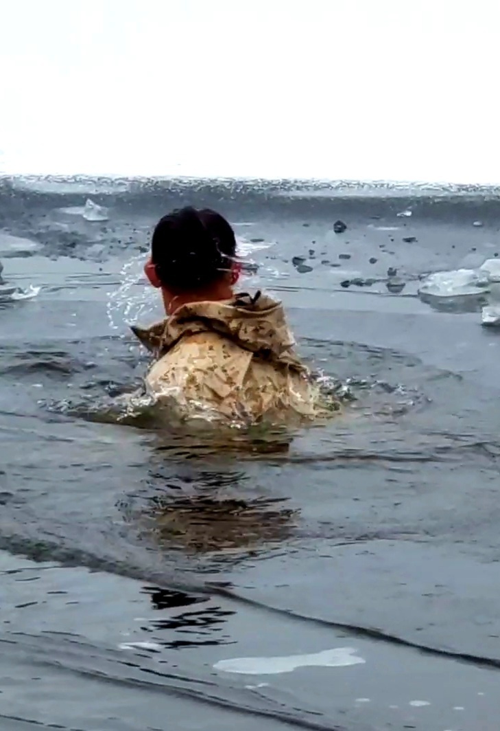 6th Marine Regiment troops jump in for cold-water immersion training at Fort McCoy