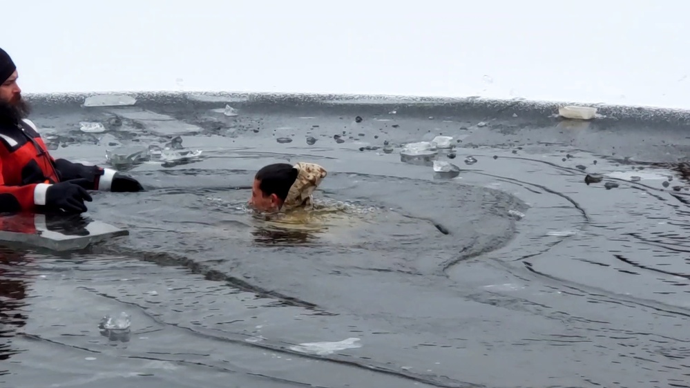 6th Marine Regiment troops jump in for cold-water immersion training at Fort McCoy