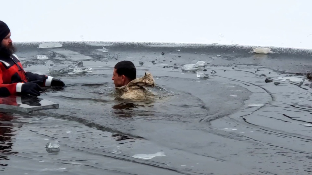 6th Marine Regiment troops jump in for cold-water immersion training at Fort McCoy