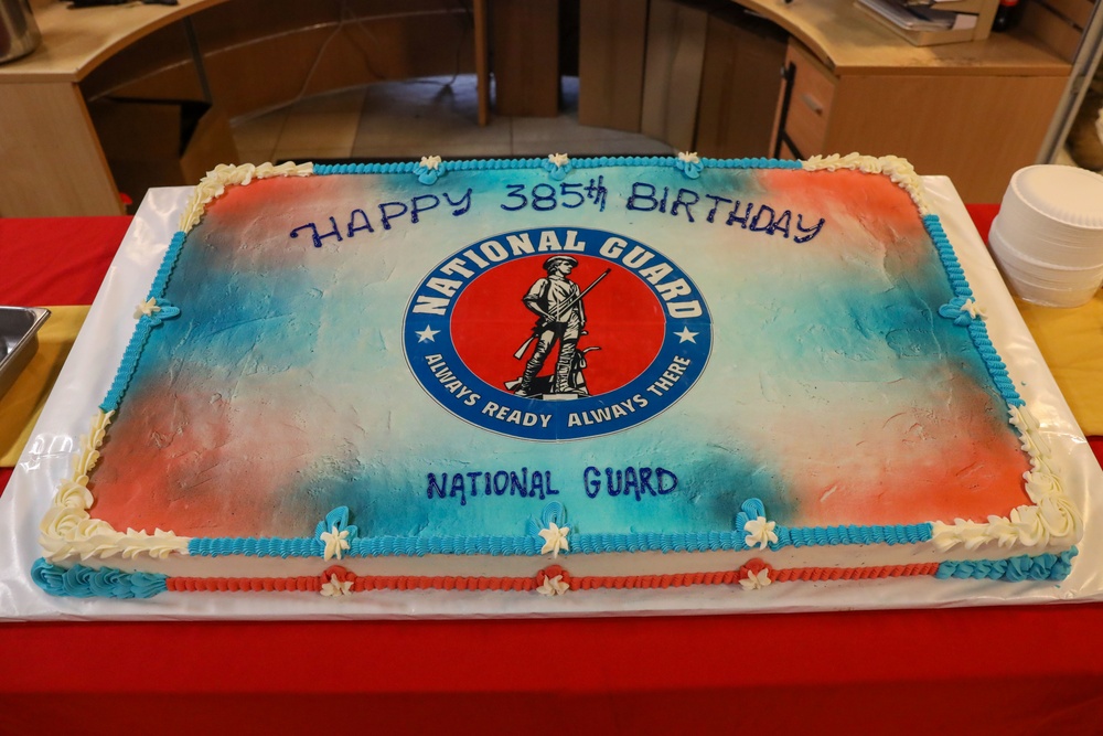 Guard members cut 385th birthday cake