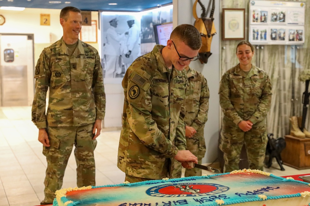 Guard members cut 385th birthday cake