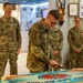 Guard members cut 385th birthday cake