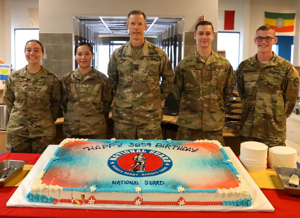 Guard members cut 385th birthday cake
