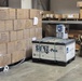 Inspecting pallets of PPE