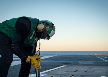 GHWB Sailor Conducts Maintenance