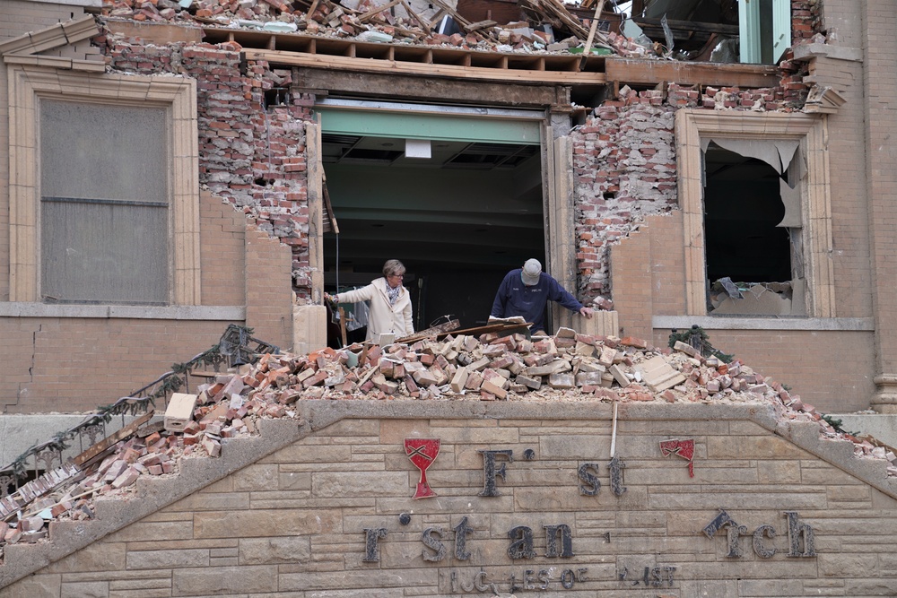 Kentucky locals sift through the destruction left by Midwest Tornado