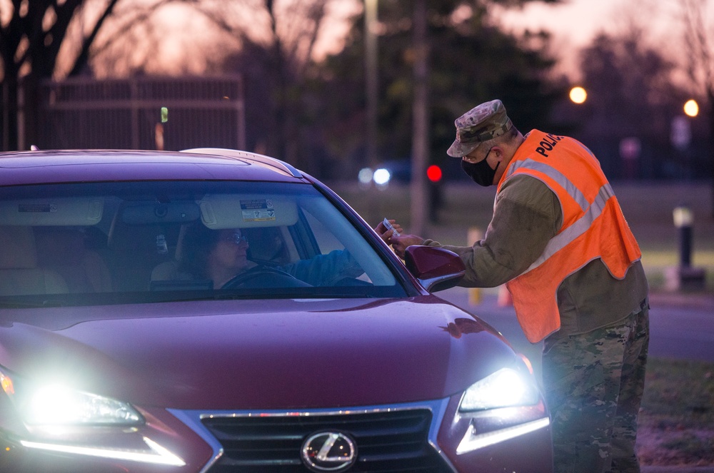 Leadership Checks IDs at Gate