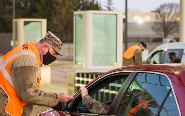 Leadership Checks IDs at Gate