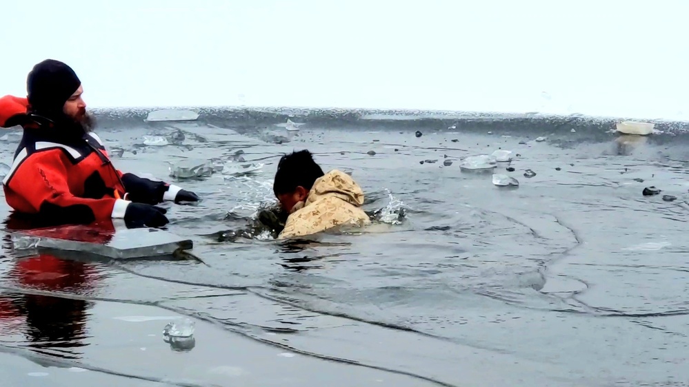 6th Marine Regiment troops jump in for cold-water immersion training at Fort McCoy