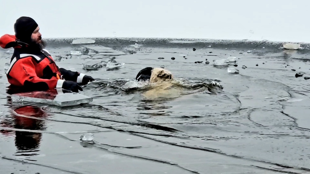 6th Marine Regiment troops jump in for cold-water immersion training at Fort McCoy