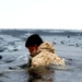 6th Marine Regiment troops jump in for cold-water immersion training at Fort McCoy