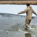 6th Marine Regiment troops jump in for cold-water immersion training at Fort McCoy