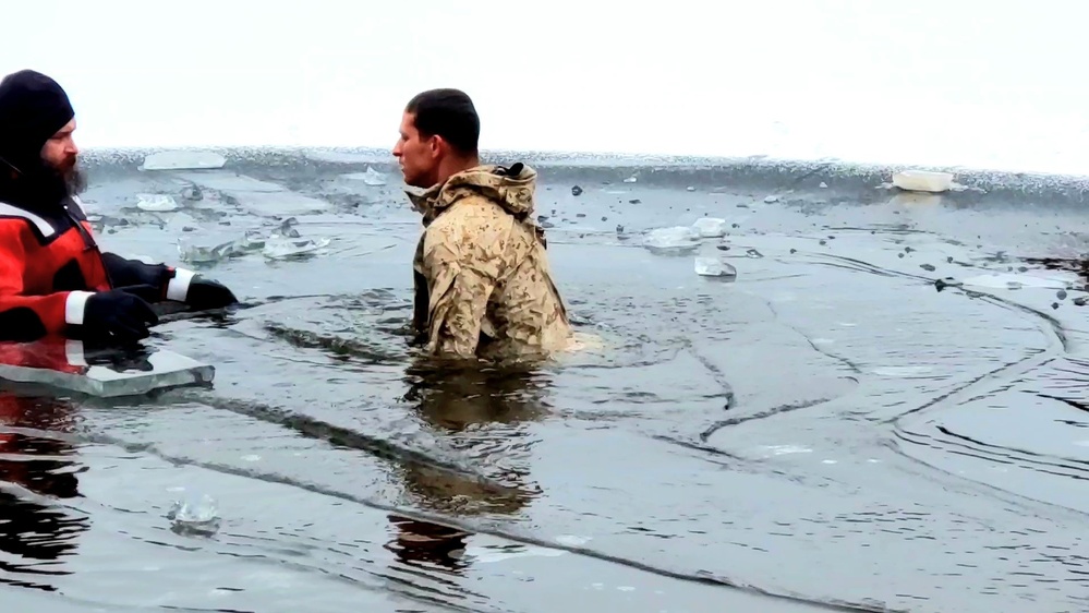6th Marine Regiment troops jump in for cold-water immersion training at Fort McCoy