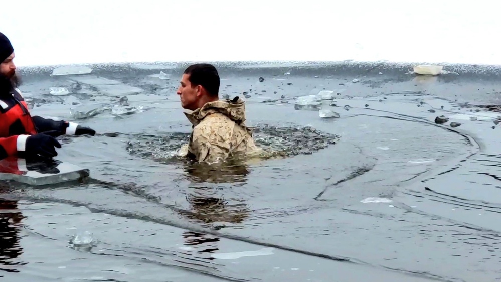6th Marine Regiment troops jump in for cold-water immersion training at Fort McCoy