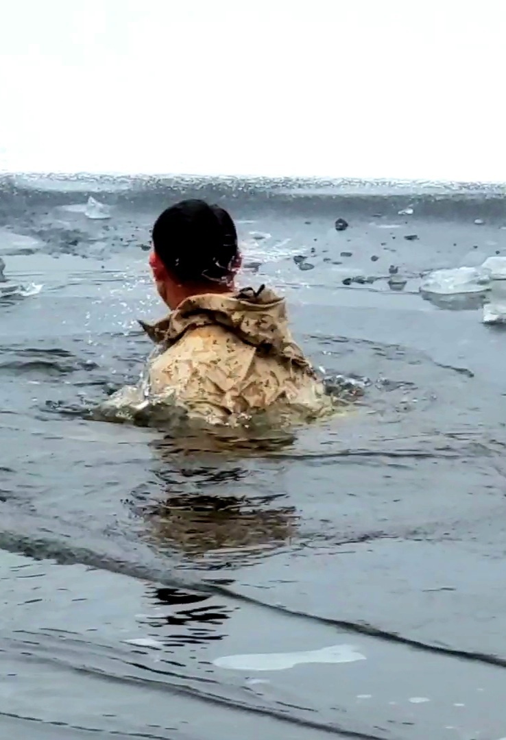 6th Marine Regiment troops jump in for cold-water immersion training at Fort McCoy