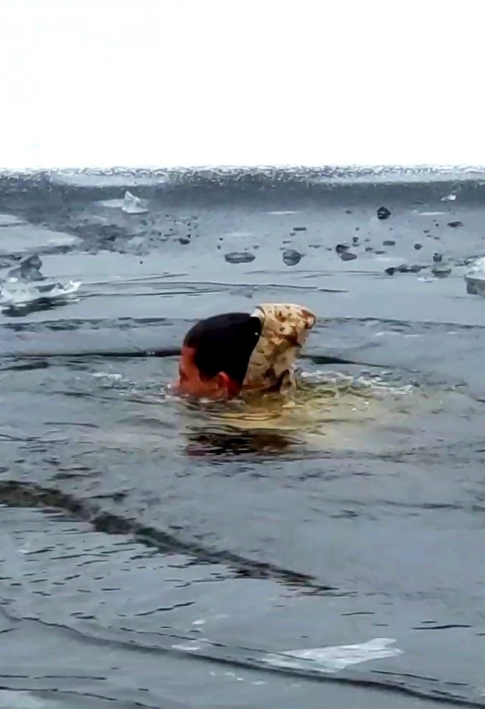 6th Marine Regiment troops jump in for cold-water immersion training at Fort McCoy