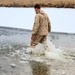 6th Marine Regiment troops jump in for cold-water immersion training at Fort McCoy