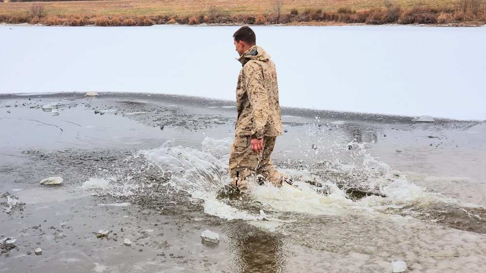 6th Marine Regiment troops jump in for cold-water immersion training at Fort McCoy