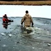6th Marine Regiment troops jump in for cold-water immersion training at Fort McCoy