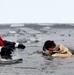 6th Marine Regiment troops jump in for cold-water immersion training at Fort McCoy