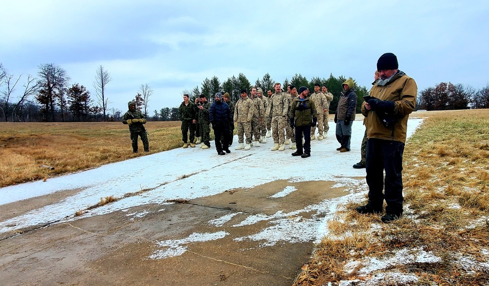 6th Marine Regiment troops jump in for cold-water immersion training at Fort McCoy