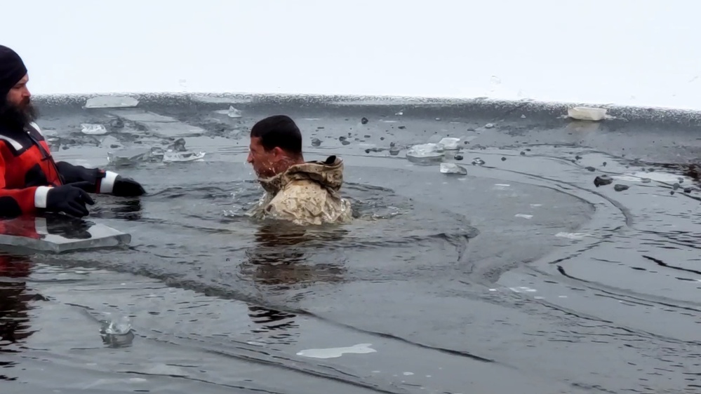 6th Marine Regiment troops jump in for cold-water immersion training at Fort McCoy