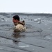 6th Marine Regiment troops jump in for cold-water immersion training at Fort McCoy