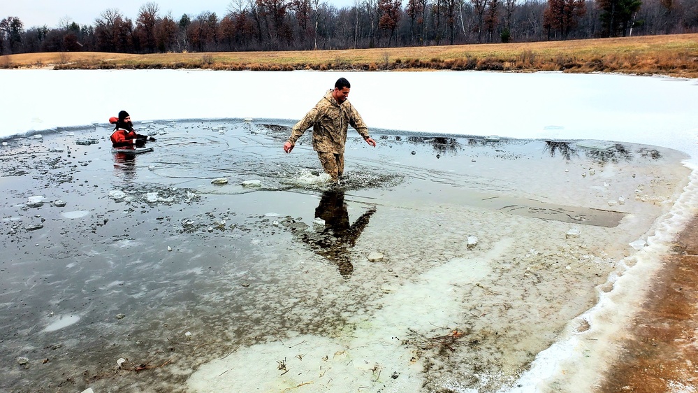 6th Marine Regiment troops jump in for cold-water immersion training at Fort McCoy