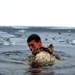 6th Marine Regiment troops jump in for cold-water immersion training at Fort McCoy