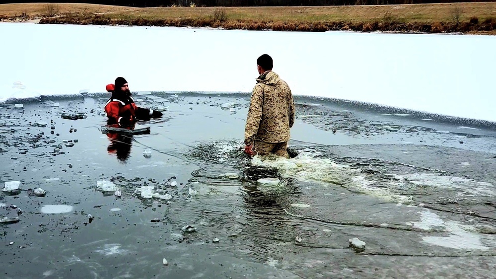 6th Marine Regiment troops jump in for cold-water immersion training at Fort McCoy