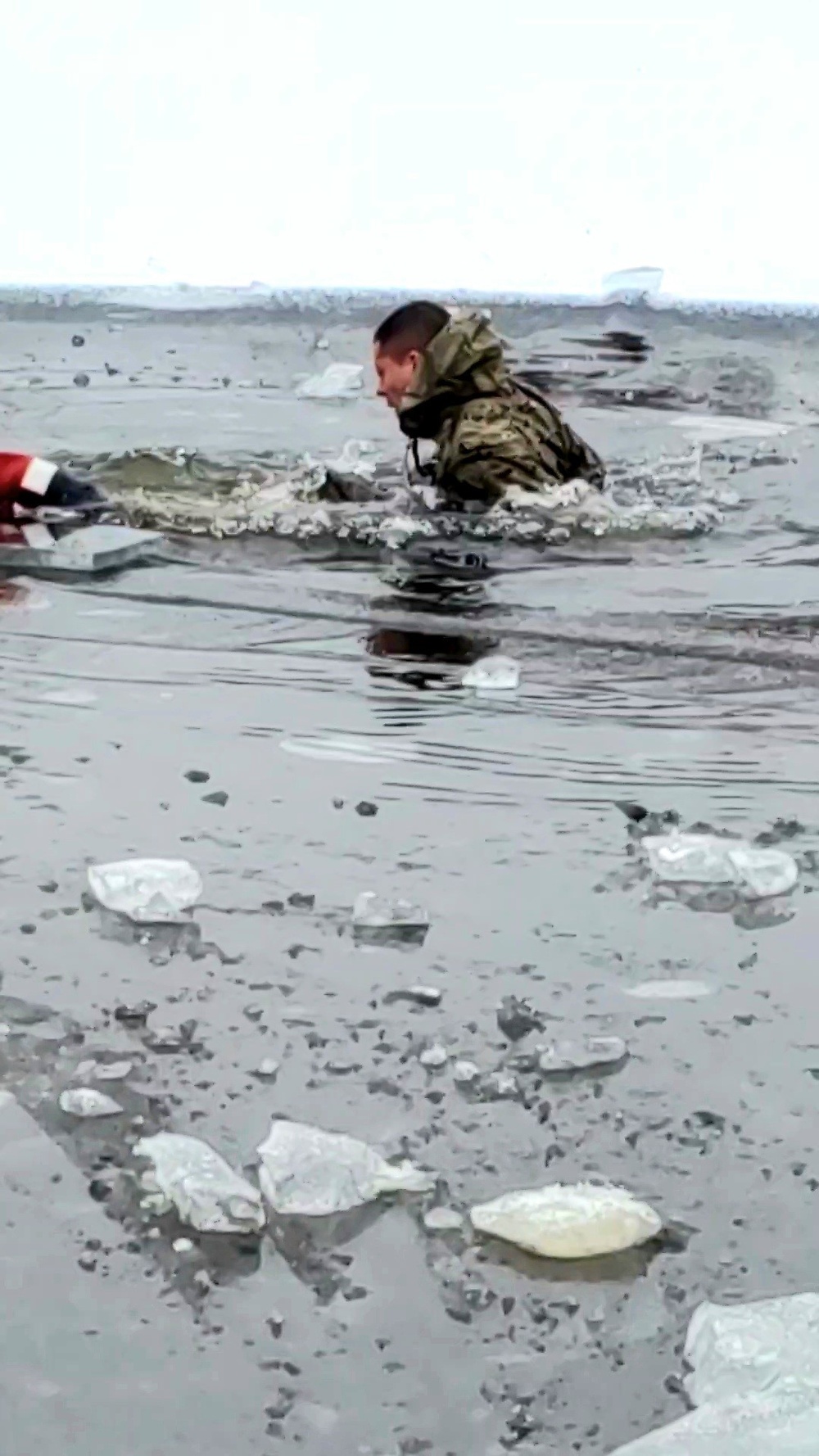 6th Marine Regiment troops jump in for cold-water immersion training at Fort McCoy