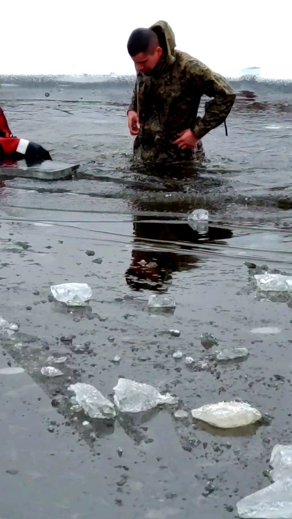 6th Marine Regiment troops jump in for cold-water immersion training at Fort McCoy