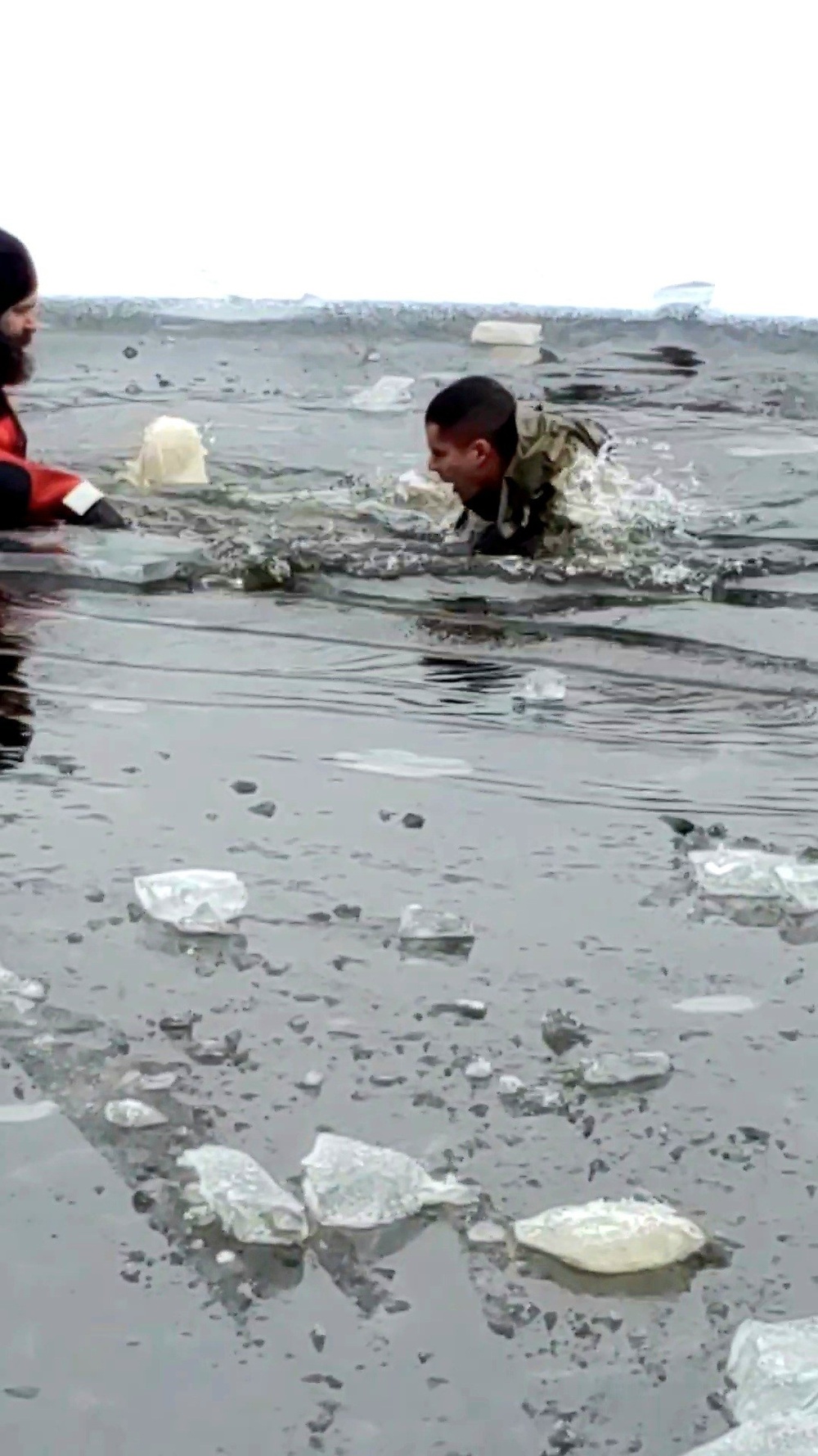 6th Marine Regiment troops jump in for cold-water immersion training at Fort McCoy