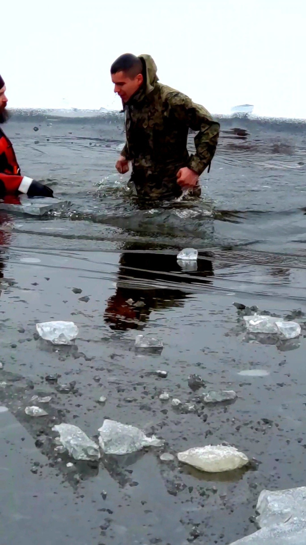 6th Marine Regiment troops jump in for cold-water immersion training at Fort McCoy