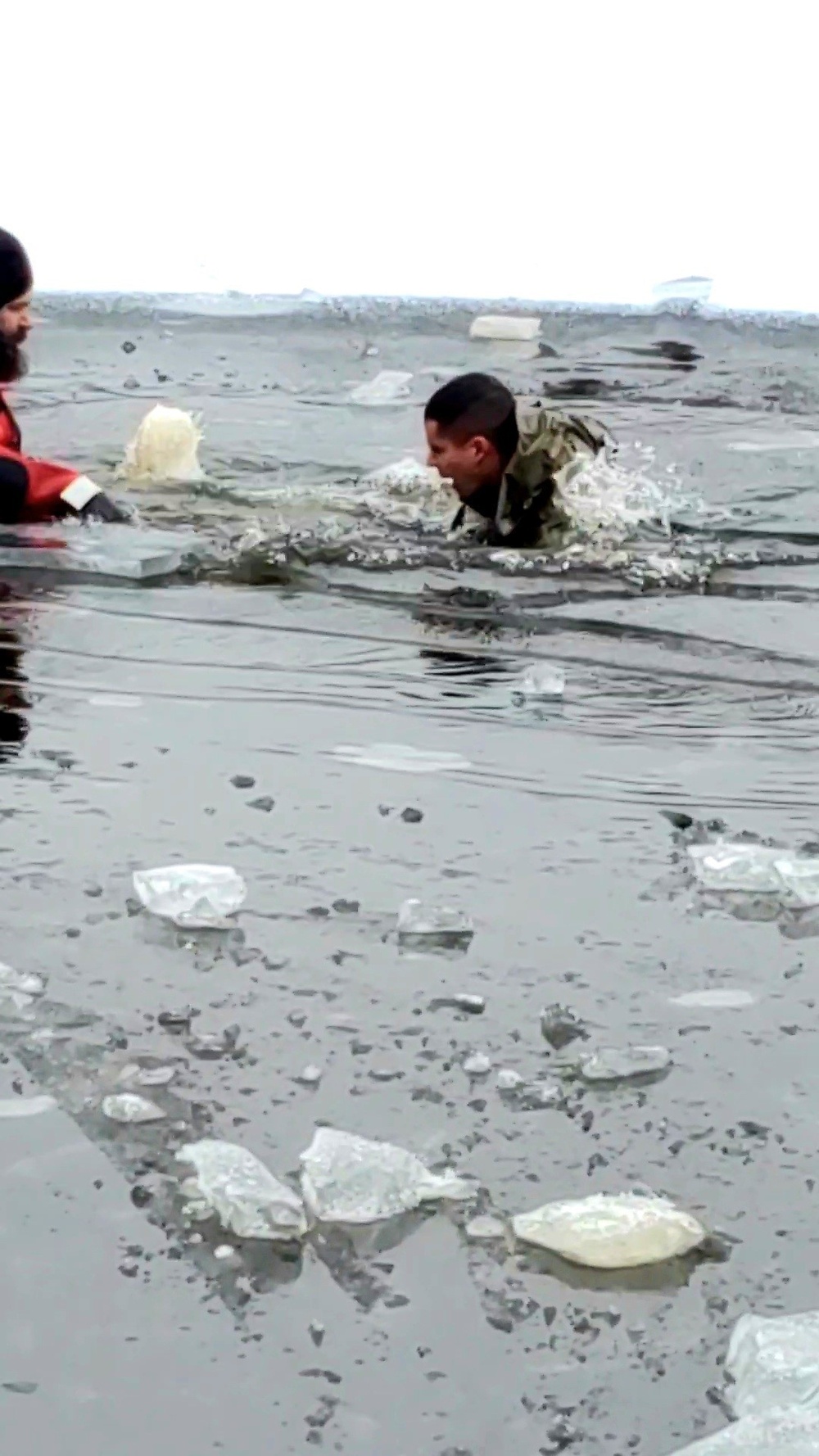 6th Marine Regiment troops jump in for cold-water immersion training at Fort McCoy