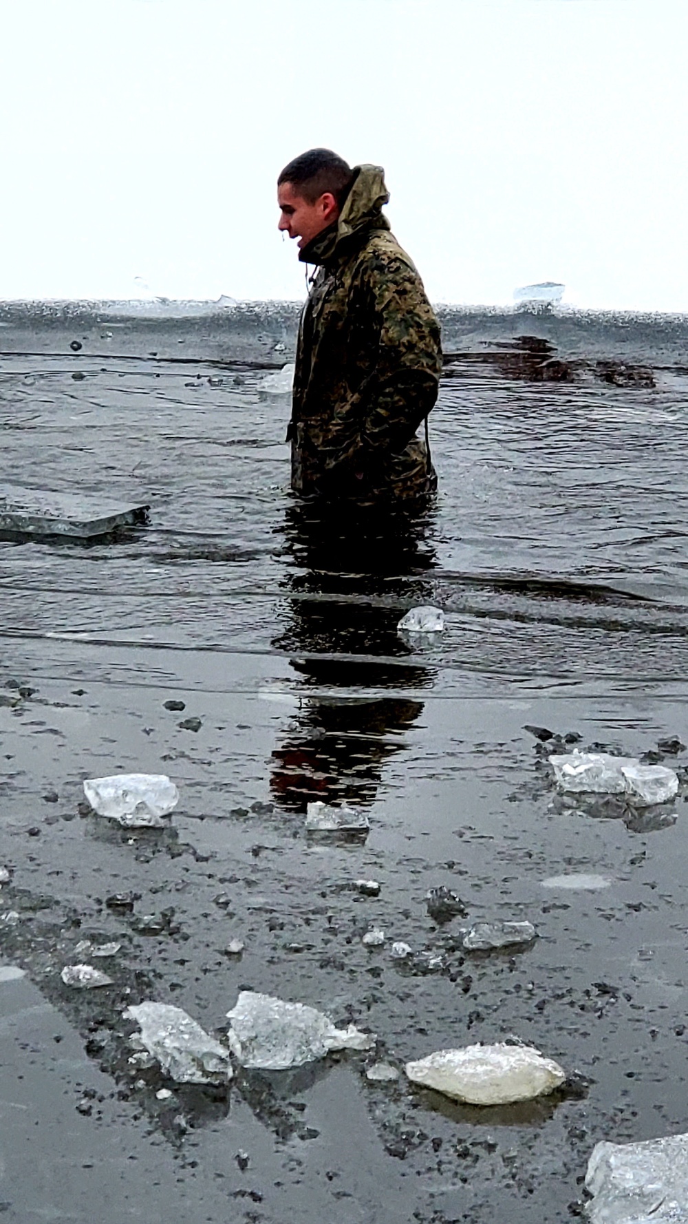6th Marine Regiment troops jump in for cold-water immersion training at Fort McCoy