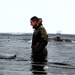6th Marine Regiment troops jump in for cold-water immersion training at Fort McCoy