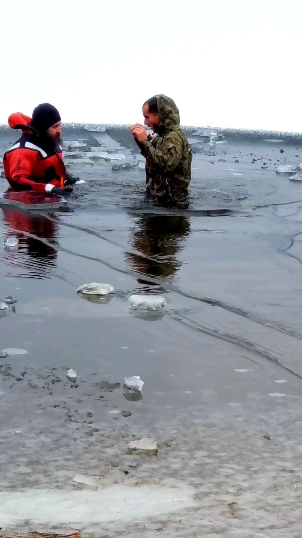6th Marine Regiment troops jump in for cold-water immersion training at Fort McCoy