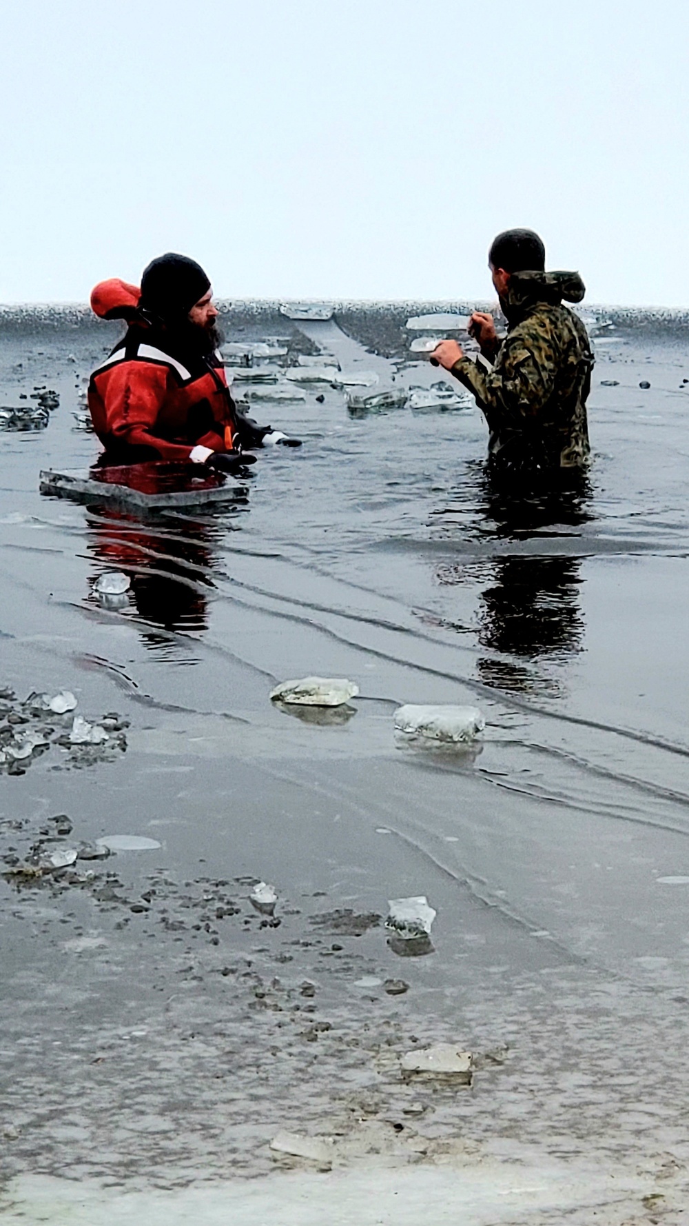 6th Marine Regiment troops jump in for cold-water immersion training at Fort McCoy