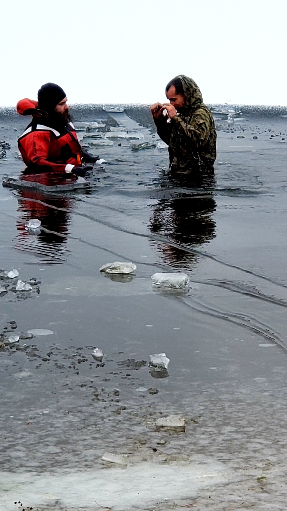 6th Marine Regiment troops jump in for cold-water immersion training at Fort McCoy