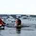 6th Marine Regiment troops jump in for cold-water immersion training at Fort McCoy