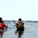 6th Marine Regiment troops jump in for cold-water immersion training at Fort McCoy
