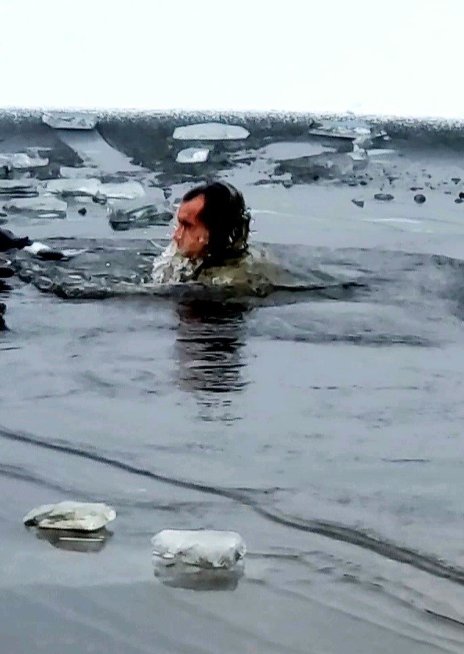 6th Marine Regiment troops jump in for cold-water immersion training at Fort McCoy